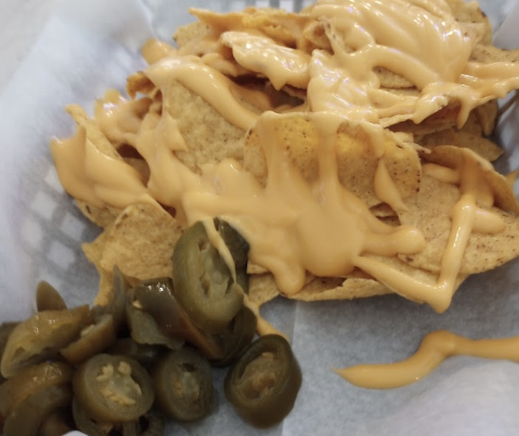 Blue Collar Bar and Grill signature dishes Steak SandwichMushroom and Swiss BurgerNachos